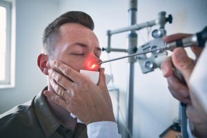 Patient,At,Ent,Clinic.,Specialist,Doctor,-,Otolaryngologist,Doing,Nose